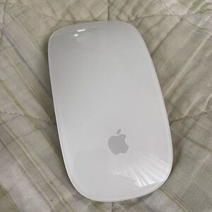 Apple magic mouse, white rechargeable multitouch surface. Like new condition.